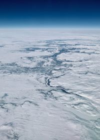 Scenic view of snow covered landscape