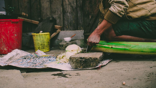 Man preparing food on table