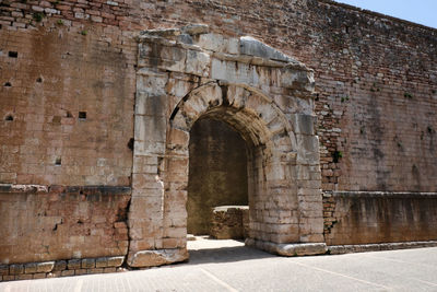 Urban gate in the medieval town of spello umbria