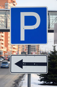 Information sign on road in city