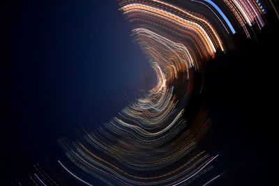 Light painting against sky at night
