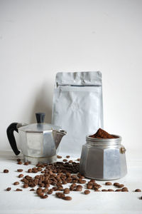 Close-up of coffee beans on table