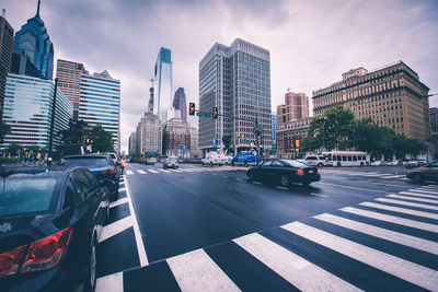 Cars on road in city