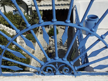 Close-up of metal fence on snow field