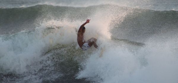 Man surfing in sea