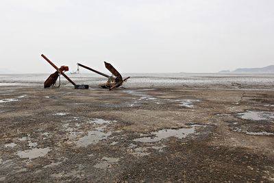 Scenic view of sea against clear sky during winter