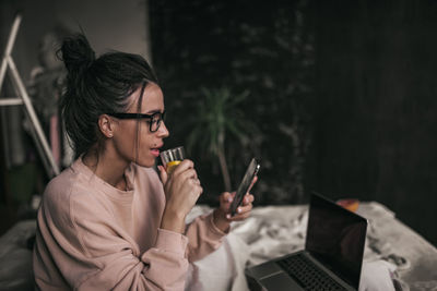 Young woman using smart phone