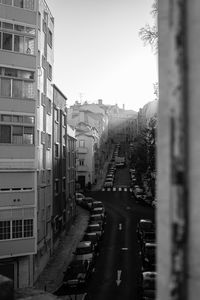 High angle view of street amidst buildings in city