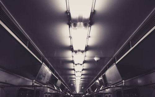 Low angle view of illuminated ceiling