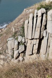 High angle view of wooden post on shore