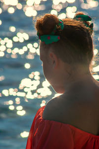 Rear view of woman looking away
