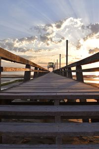 Pier over sea against sky