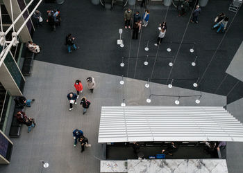 High angle view of people walking on street