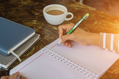 High angle view of coffee cup on table