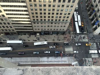 High angle view of buildings with traffic on street