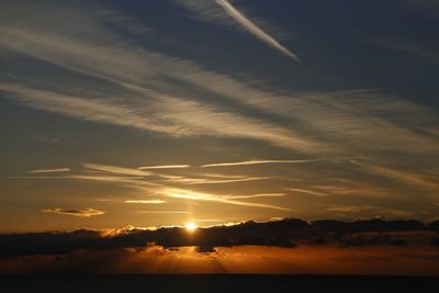 Scenic view of dramatic sky during sunset