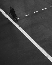 Man walking on road