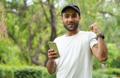 Young man using mobile phone