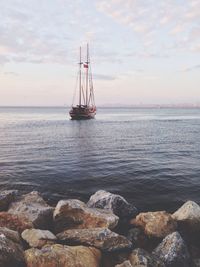 Sailboat sailing in sea