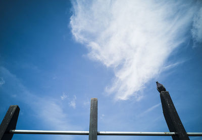 Low angle view of smoke stack against sky