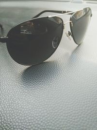 Close-up of sunglasses on table