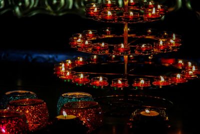 Close-up of illuminated lanterns at night