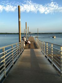 Pier on sea against sky
