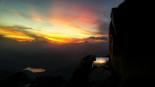 Scenic view of mountains at sunset