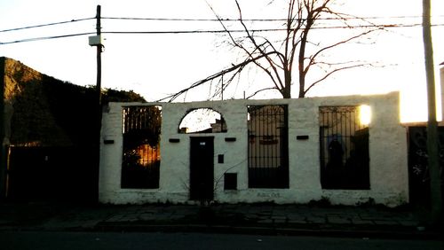 Illuminated buildings against clear sky