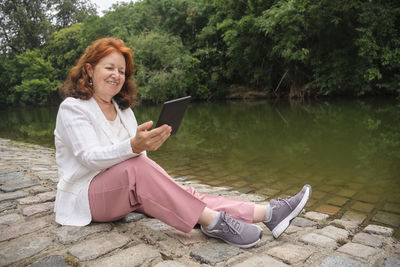 Young woman using mobile phone