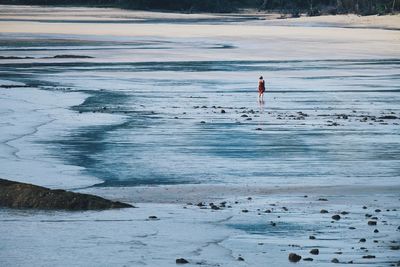 Person standing on beach