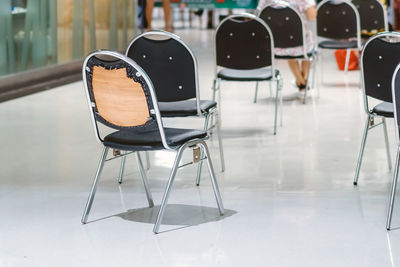 Empty seats on table in building