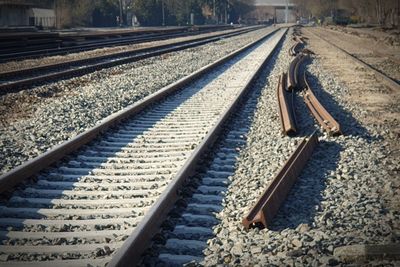 Sunlight falling on railroad track