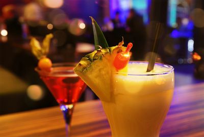 Close-up of cocktails on table in bar