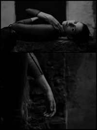 Portrait of young woman sitting on floor