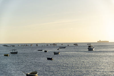 Scenic view of sea against clear sky during sunset