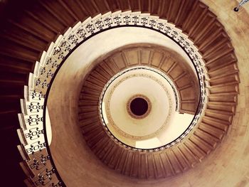 Directly below shot of spiral staircase in building