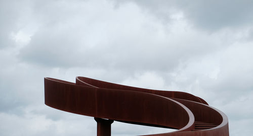Low angle view of playground against sky