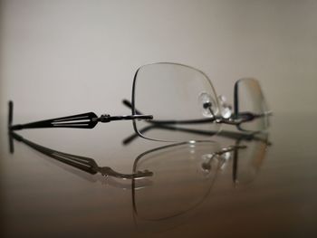 Close-up of eyeglasses on table