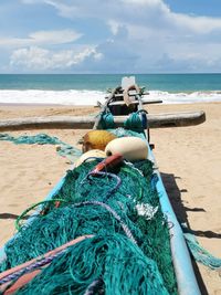 Fishing net in boat at beach