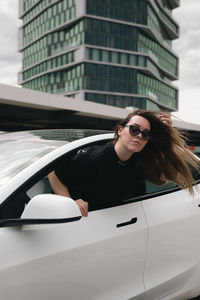 Young woman in car