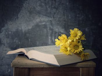 Yellow flowers on table