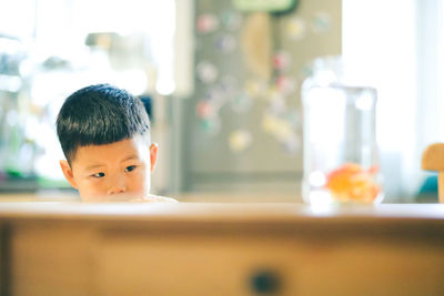 Portrait of boy in bathroom at home