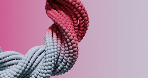 Close-up of rope against blue background