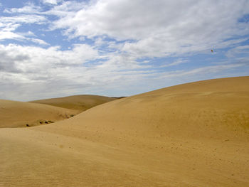 Scenic view of sand dunes at medanos de coro national park against sky