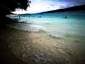 Scenic view of beach against sky