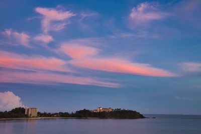 Scenic view of lake against sky during sunset