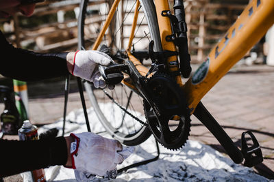 Person repairing bicycle