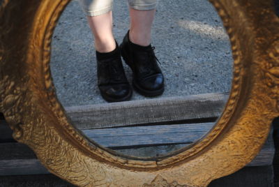 Low section of man standing outdoors