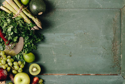 High angle view of various vegetables and fruits on table